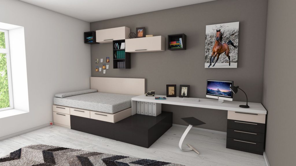Tiroirs de rangement glissés sous un lit dans une chambre